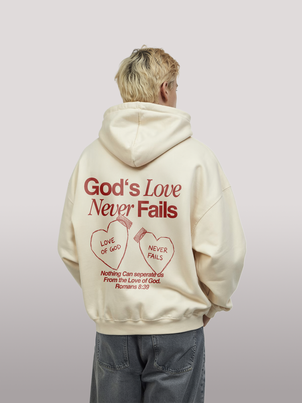 LOVE NEVER FAILS OVERSIZED HOODIE